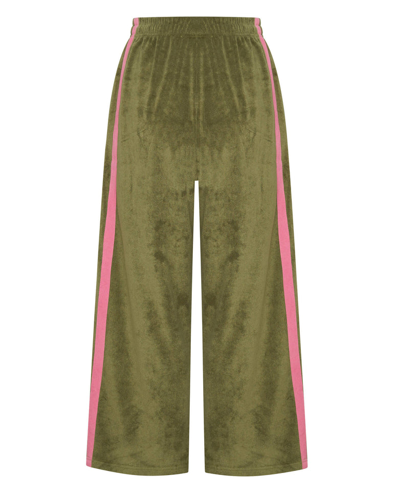 Green terry towelling pants with pink side stripes on a white background