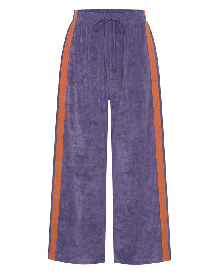 Purple pants with orange stripes on a white background