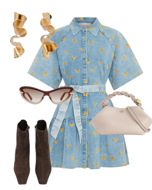 Fashionable outfit with a denim dress, sunglasses, boots, and handbag on a white background