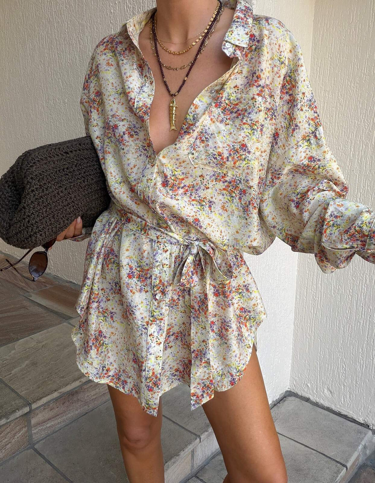 La Bohème Girls Lucky Fish Necklace – layered with a floral shirt dress